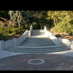 the stairs lead up to the top of the hill