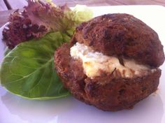 a close up of food on a plate with lettuce