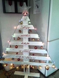 a christmas tree made out of wooden planks