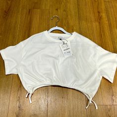 Zara Kids! New With Tags! Size 11 For Girls Plain White Summer Top, White Plain Tops For Summer, Cute White Stretch Tops, Plain Cotton Crop Top For Summer, Plain Cotton Crop Top For Spring, Zara Casual Crew Neck Crop Top, White Crop Top T-shirt For Spring, Casual Zara Crew Neck Crop Top, White Casual Cropped T-shirt For Spring