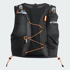 the back of a black vest with orange straps and water bottles attached to it's side