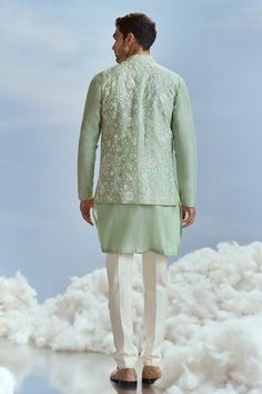 Mint floral embroidered bundi. Paired with an inner kurta and pant. - Aza Fashions Designer Chikankari Embroidery Kurta For Spring, Designer Spring Kurta With Chikankari Embroidery, Designer Spring Sherwani With Zari Work, Designer Spring Festive Sherwani, Spring Festive Designer Sherwani, Designer Bandhgala With Zari Work For Spring, Spring Fitted Dabka Sherwani, Traditional Spring Nehru Jacket With Dabka, Straight Kurta Nehru Jacket With Zari Work For Spring