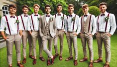 a group of young men standing next to each other on top of a lush green field