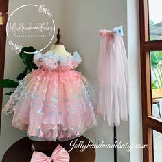 ♥ ENCHANTING ELEGANCE: BIRTHDAY BLISS WITH THE BUTTERFKY TULLE DRESS Are you looking to make your little girl's birthday celebration truly enchanting and memorable? Look no further than the exquisite Butterfly Tulle Dress from JollyHandmadeBaby! Our dress combines elegance and whimsy, creating a magical experience that your daughter will cherish forever. In this article, we will explore the enchanting features of the Butterfly Tulle Dress and how it can add bliss to your little one's birthday ce Playful Pink Tulle Princess Dress, Playful Pink Dress For First Birthday, Pink Princess Dress For First Birthday In Spring, Sweet Pink Princess Dress With Short Sleeves, Fitted Pink Dress For Easter, Fitted Pink Easter Dress, Pink Princess Dress For Easter, Pink Tulle Dress For Easter, Sweet Pink Tulle Dress