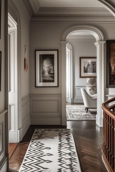 the hallway is clean and ready for us to use as an entrance way in this home