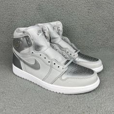 Item: Nike Air Jordan 1 High Og - Co Jp Tokyo Size: Men's 8.5 Year: 2020 Condition: Brand New, Never Worn, With Original Box - Shipped Through Usps With Tracking Confirmation - Handling Time 1-2 Business Day - Feel Free To Ask Any Questions You May Have - Everything Is 100% Authentic Modern Silver Lace-up Custom Sneakers, Silver Lace-up Basketball Shoes, Silver High-top Basketball Shoes For Streetwear, Silver High-top Sneakers With Abzorb Midsole, Sporty Silver Basketball Shoes For Streetwear, Metallic Sneakers With Perforations, Metallic Sneakers With Perforations And Round Toe, Silver Sporty Sneakers With Round Toe, Sporty Silver Sneakers With Perforations