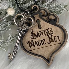 the key to santa's magic key is hanging from a tree