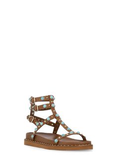 - Brown ASH leather woman's sandals - Round toe - Contrasting color studs details - Three ankle straps with buckleComposition: 100% Calf Leather Sole:, 100% Rubber Studded Ankle Strap Sandals For Summer, Studded Leather Sandals For Spring, Studded Flat Heel Sandals, Summer Leather Sandals With Studs, Leather Sandals With Studs For Summer, Studded Round Toe Beach Sandals, Studded Round Toe Sandals For Beach, Studded Flat Heel Sandals For Spring, Flat Studded Sandals For Summer