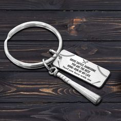 a metal keychain that says, not steal it blood but silver by heart