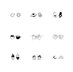 various stickers that are on the side of a white wall, including cats and other animals