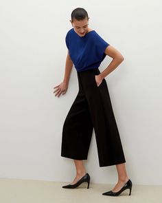 The Zhou Culotte - Black | M.M.LaFleur Sleek Structured Bottoms, Structured Bottoms For Business Casual In Spring, Structured Bottoms For Business Casual Spring Wear, Modern Evening Bottoms For Summer, Modern Summer Evening Bottoms, Chic Pleated Waist Culottes For Work, Elegant Workwear Culottes With Cropped Leg, Elegant Cropped Leg Culottes For Work, Versatile Evening Wide Leg Pants For Spring