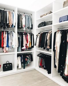 an organized closet with clothes and handbags