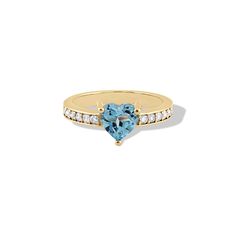 Heart-Shaped Blue Topaz and Diamond Ring in 14k Yellow Gold Show your love with this enchanting Heart-Shaped Blue Topaz and Diamond Ring, exquisitely crafted in 14k yellow gold. Features a 7mm heart-shaped natural blue topaz gemstone 12 natural diamonds (SI1, G color) set along the band Made from high-quality 14k yellow gold 3mm wide band for a comfortable fit Custom engraving available Includes a cleaning cloth, certificate of authenticity (COA), a pouch, and a box Ideal for those who appreciate elegant and timeless jewelry, this stunning blue topaz and diamond ring is perfect for special occasions or everyday wear. Add this beautiful piece to your collection today and let your love sparkle. Blue Topaz Heart Cut Promise Ring, Heart Cut Blue Topaz Rings For Anniversary, Blue Topaz Heart Cut Gemstone Rings, Heart Cut Topaz Gemstone Ring For Promise, Heart Cut Topaz Ring For Promise, Heart Cut Topaz Promise Ring, Heart Cut Blue Topaz Gemstone Rings, Blue Topaz Ring In Yellow Gold For Promise, 14k Gold Heart Cut Birthstone Ring With Center Stone