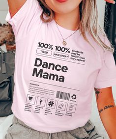 Know someone who is a dance mom, dance teacher, and is always at dance competitions? Get them this funny dance mama shirt! Our heavy blend shirts are made from 100% ring spun cotton and are double stitched on all seams as well as pre-shrunk for superior product durability. This shirt has a relaxed fit. For an oversized look or dress look, please size up. Purchase does not include photo props. ⭐Shipping ⭐ All of our products have free shipping. Our goal is to ship your order out as quickly as pos Pink Graphic Print Top For Dance Class, Pink Letter Print T-shirt For Dance Class, Pink Graphic Print Top For Dance, Pink Cotton T-shirt For Dance, Pink T-shirt With Graphic Print For Dance Class, Pink Letter Print Top For Dance, Pink Graphic Print T-shirt For Dance Class, What Is Dance, Dance Mom Shirt