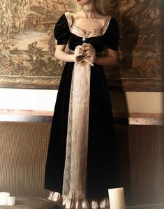 Look your best in this luxurious Bridgerton-inspired regency era black velvet ball gown. This elegant empire-waisted dress is perfect for any special occasion. With its classic silhouette, this dress will make you look and feel like a queen. The velvet is soft and comfortable and the empire waist gives it a flattering fit. The dress features short sleeves and a floor-length skirt. It also comes in plus size to ensure a perfect fit. Whether you're attending a black-tie event or just want to ... Bridgerton Experience, Velvet Ball Gown, Ancient Princess, Princess Vintage, Regency Gown, Bridgerton Inspired, Op Dress