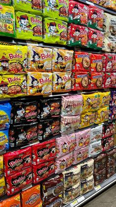 a display in a store filled with lots of different types of snacks and cereals