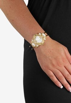 Stunning simulated cameo bangle bracelet offers rich adornment with its elegant heirloom look and embellishments of simulated pearl and crystal accents. 7 Platinum Credit Card, Vintage Cameo, Drawstring Pouch, Hinged Bangle, Bangle Bracelet, Accessories Shop, Jewelry Shop, Bangle Bracelets, Embellishments