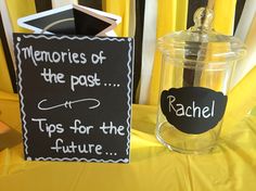 a sign that says memories of the past tips for the future next to a jar