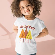 "Hello Autumn Organic cotton kids t-shirt clothing. Check out matching \"Hello Fall design adult t-shirt\": https://www.etsy.com/listing/1054384063/hello-fall-simple-autumn-tree-design?ref=shop_home_active_2&pro=1&frs=1 Put your kids in a t-shirt that's cute, super comfortable, and made of natural fabrics! This 100% organic cotton tee is sure to become their favorite! * 100% organic ring-spun combed cotton * Fabric weight: 4.57 oz/yd² (155 g/m²) * Single jersey * Medium fit * Set-in sleeves * 1× Playful Crew Neck T-shirt For Fall, Playful Pre-shrunk T-shirt For Fall, Playful Short Sleeve T-shirt For Fall, Playful Short Sleeve Fall T-shirt, Fun White T-shirt For Fall, White T-shirt For Fall Family Matching, Fall Graphic Tee, Winter Tees, Fall Graphic