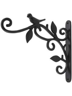 a black metal hook with two birds on it