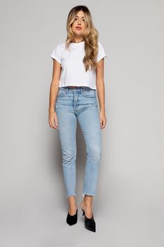 The CINDY is the perfect white tee, that every woman needs. This classic tee features a cropped style that sits on the natural waistline. Everyday Light Wash Cropped Bottoms, Light Wash Cropped Bottoms For Everyday, Classic Cropped Crop Top, Everyday Cropped Cotton Bottoms, Basic Cropped T-shirt For Everyday, Everyday Cropped Bottoms With Frayed Hem, Simple Cropped T-shirt For Spring, Everyday Cropped T-shirt For Spring, Basic Everyday Cropped T-shirt