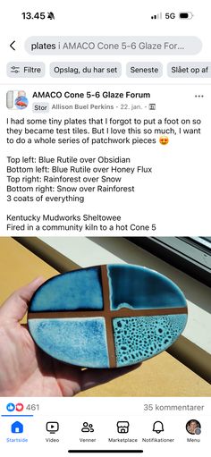 someone is holding a blue and brown ceramic plate with holes in the middle, on their left hand