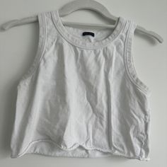 White Cropped Brandy Melville Shirt; Never Worn White Basic Cotton Crop Top, Basic White Cotton Crop Top, White Cotton Crop Top For Everyday, Basic Sleeveless Top For Day Out, White Summer Crew Neck Top, White Crew Neck Summer Top, Casual Cropped Cotton Top, Casual White Crop Top For Everyday, White Cotton Tank Crop Top