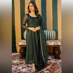 Brand New With Tags. Shirt Fit Slim ,Cut/Style Classic Piswas,Khaddi Net,Front Faux Mirror And Sequin Embroidered,Back Plain Dyed,Neckline Round,Sleeves Embroidered Borders Dupatta Organza Sequin Embroidered Dupatta Designer: Cross-Stitch Color: Dark Green Green Long Sleeve Dress With Self Design, Green Long Sleeve Lawn Suit For Party, Striped Boyfriend Shirt, Bra Top Dress, Velvet Tunic, Indian Tunic, Tunic Style Tops, Ruffled Tunic, Floral Tunic