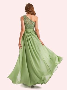 a woman in a long green dress