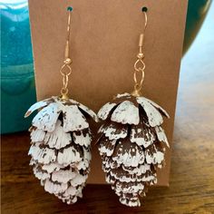 These Snow Flocked Pine Cone Earrings Are A-Mazing!!! They Look Real And No Two Are Exactly The Same. They Are Not Flat, This Is A 3-D Little Pine Cone. They Could Also Double As Really Great Tree Ornaments! Great For Christmas Or To Wear All Winter Long! All My Earrings Include Backs. Drop Length Is Approx 2.5.” Width Is Approx 1.” All Jewelry In My Closet Is Buy 2, Get 1 Free!!! To See My Full Selection, Type “Jewelry” In The Search Bar At The Top Of My Closet. Includes Sets And Seasonal Holid Pine Cone Earrings, Football Earrings, Turquoise Western, Gold Chandelier Earrings, Ear Crawler Earrings, Oval Stud Earrings, Ear Pins, Prom Jewelry, Link Earrings