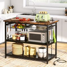 a kitchen island cart with food on it