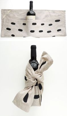 a bottle of wine wrapped in a scarf