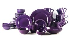 purple dishes and cups are stacked on top of each other