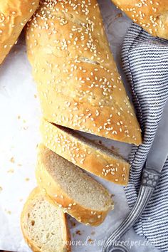 sliced bread with sesame seeds on top