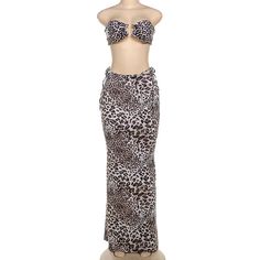 SPECIFICATIONS Brand Name: TAVIMART Fabric Type: Broadcloth Style: Y2K Material: SPANDEX Material: POLYESTER Fabric content: 91% (inclusive) - 95% (inclusive) Decoration: Backless Decoration: Printing Closure Type: Pullover Material Composition: synthetic fiber Pattern Type: LEOPARD Silhouette: Sheath Two-piece Skirt For Beach Season Parties, Split Bottoms For Club And Summer, Stretch Two-piece Beach Skirt, Stretch Two-piece Skirt For Beach, Two-piece Party Skirt For Beach Season, Beach Season Two-piece Party Skirt, Summer Club Maxi Skirt, Fitted Skirt Set For Beach, Beach Season Fitted Split Skirt