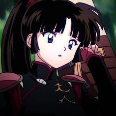 an anime character with long black hair and blue eyes, wearing a dark outfit in front of trees