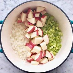 apples, onions and celery are mixed in a pot