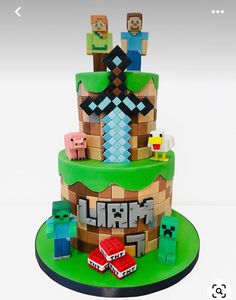 a cake made to look like an old school video game with the characters from minecraft on it