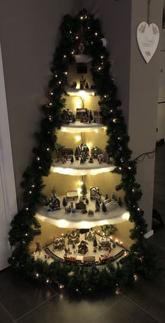 a christmas tree made out of legos and lights