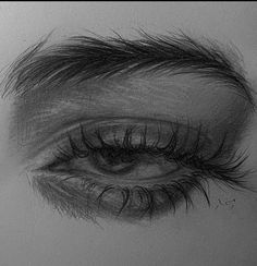 a pencil drawing of an eye with long lashes