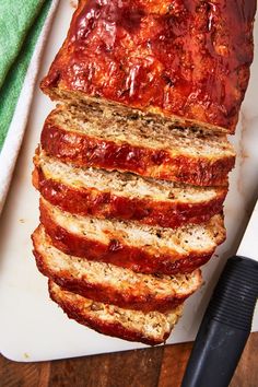 slices of meatloaf on a cutting board