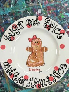 a white plate with red and black writing on it that says, ginger and spice