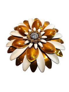 Cool 3D layered gold and white flower enameled brooch/pin.  This pre-owned piece reminds me of the 60's and 70's.  In good vintage condition, it does have wear consistent with the age of the item.  Please review pictures.  It has gold and white petals with gold and clear rhinestones in the center.  Approximately 2.5" across.  Just a very neat retro piece. Here is a link to our shop. Thank you for stopping by.  Hope to see you again soon. https://www.etsy.com/shop/KatiebeeVintageFinds Please note Retro Gold Enamel Brooches, See You Again Soon, White Petals, Cool 3d, Wedding Brooch, Vintage Mid Century Modern, See You Again, Enamel Brooch, Clear Rhinestones