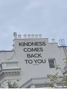 The top of the building says, “Kindness comes back to you.” Kind Person, Prayer Board, Happy Words, Random Acts Of Kindness