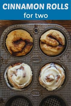 cinnamon rolls in a muffin tin with icing and cinnamon on the top, ready to be eaten