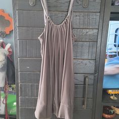 New With Tags Bcbg Dress, Size L Gray In Color. Flowy Sleeveless Lounge Dress, Flowy Sleeveless Dress For Loungewear, Chic Knee-length Loungewear Dresses, Sleeveless Sundress Mini Dress For Loungewear, Flowy Sleeveless Sundress For Loungewear, Loungewear Mini Sundress, Chic Sleeveless Sundress For Loungewear, Flowy Midi-length Dresses For Loungewear, Flowy Midi Length Dresses For Loungewear