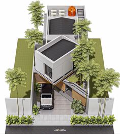 an aerial view of a modern house with trees