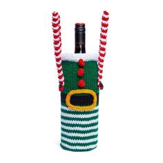 a green and white striped wine bottle holder with two bottles in the shape of a christmas tree