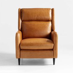 a brown leather recliner chair on a white background