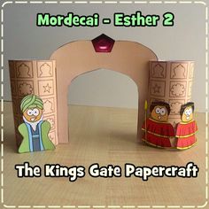 the king's gate papercraft is made out of cardboard and has two people on it